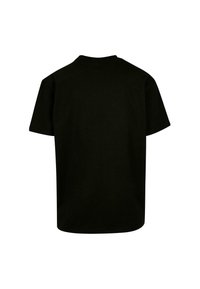 Schwarzes T-Shirt mit kurzen Ärmeln und rundem Halsausschnitt. Glattes Baumwollmaterial, lockere Passform und keine sichtbaren Etiketten oder Verzierungen.