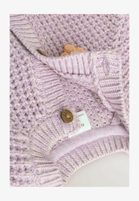 Seleccionado, purple and apricot flower baby