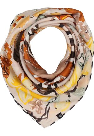 Silk scarf with abstract floral patterns in yellow, brown, and beige tones, folded in a circular, layered shape.