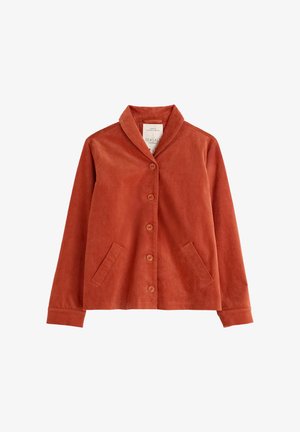 Rust-colored corduroy jacket with a shawl collar, front button closure, and two angled pockets. Features a smooth texture and soft fabric.