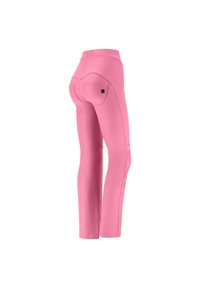 Vaaleanpunaiset legginssit, joissa on sileä pinta, korkea vyötärönauha ja koristeelliset ompeleet. Takana pieni tasku, jossa logotunnus.