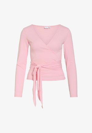 Light pink long-sleeve wrap top with V-neck and a fabric belt tied in a bow at the waist, made from soft, stretchy material.