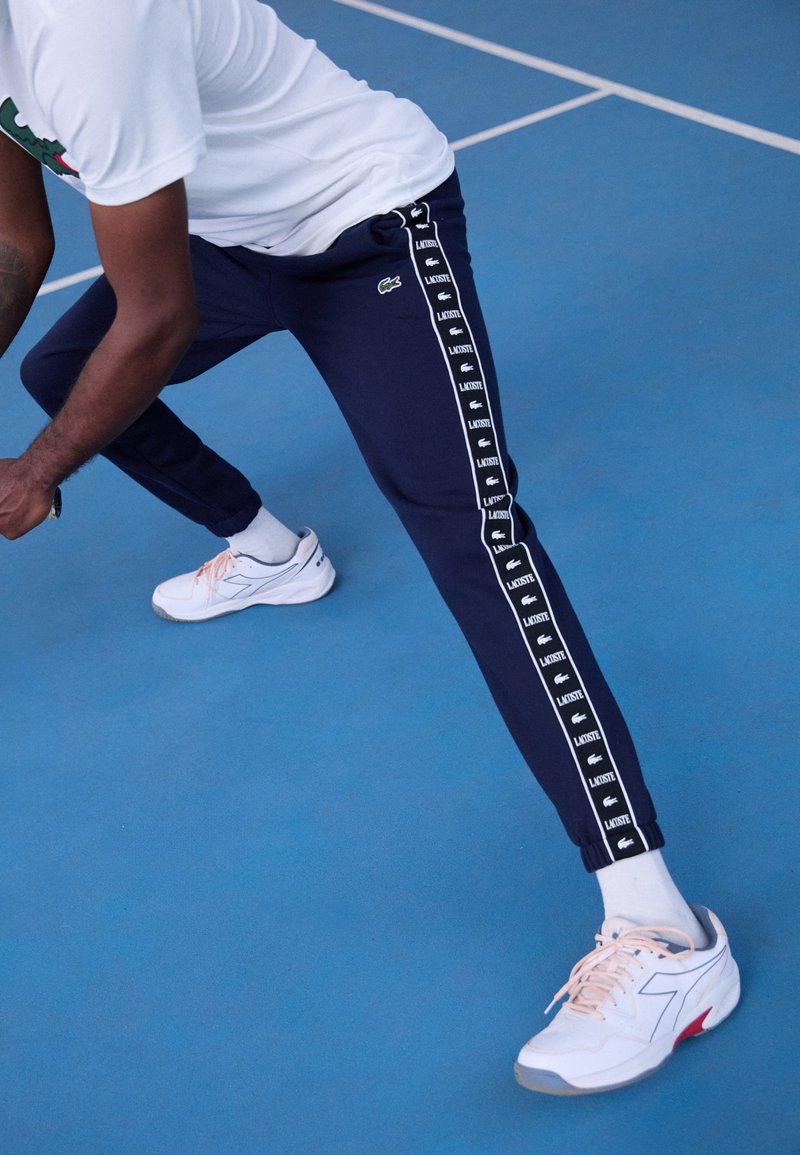Lacoste Sport TROUSERS TAPE - Treniņtērpa apakšdaļas - navy blue