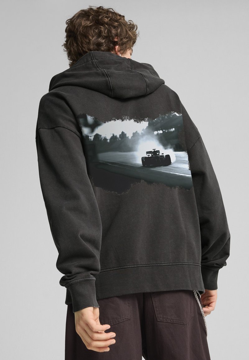 Puma - F1® GRAPHIC  - Zip-up sweatshirt - black, Enlarge