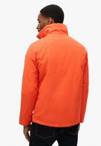 Superdry & Co ULTIMATE - Overgangsjakke - bold orange