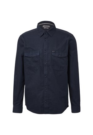 Marineblauw overhemd met lange mouwen van katoen, voorzien van een button-down kraag, twee borstzakken en een rechte zoom met lichte zijsplitten.