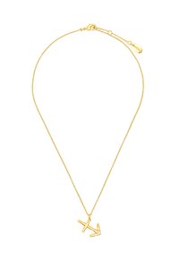 Złoty łańcuszek naszyjnik o minimalistycznym designie z abstrakcyjnym wisiorkiem w kształcie litery. Łańcuszek zawiera zapięcie typu lobster oraz regulowaną długość.