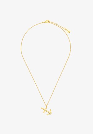 Złoty łańcuszek naszyjnik o minimalistycznym designie z abstrakcyjnym wisiorkiem w kształcie litery. Łańcuszek zawiera zapięcie typu lobster oraz regulowaną długość.