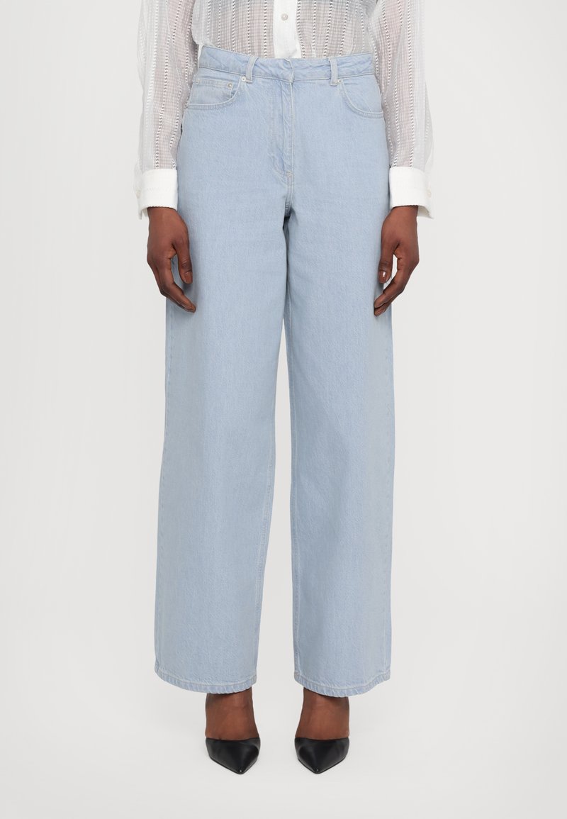 REMAIN COCOON PANTS - Široke nogavice - light blue