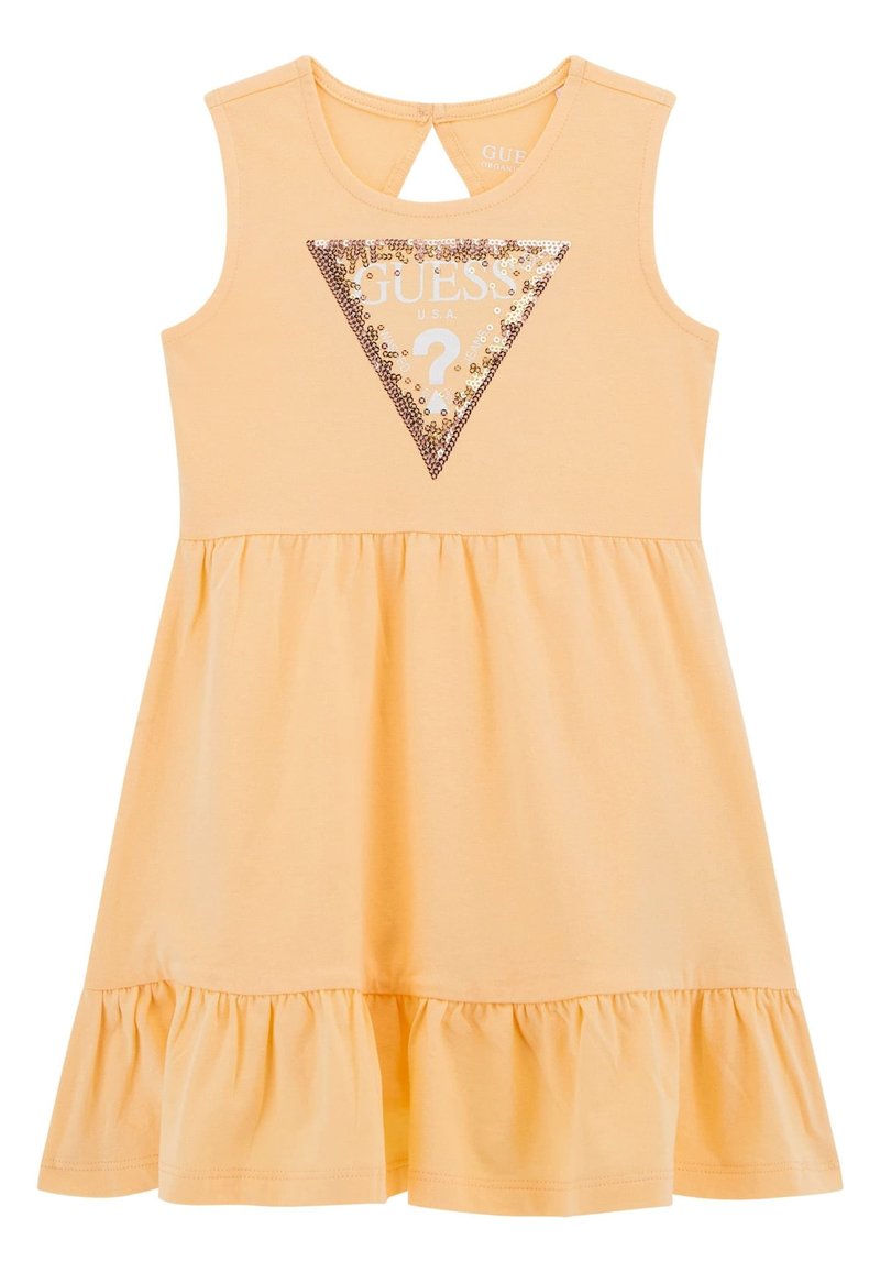 Gelbes ärmelloses Kleid mit einem schwingenden Rock, das mit einer dreieckigen Paillettenverzierung mit dem Text "GUESS U.S.A." und einer Schlüssellochöffnung im Rücken versehen ist.