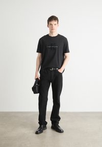 Calvin Klein Jeans MONOLOGO TEE - T-shirt print - black