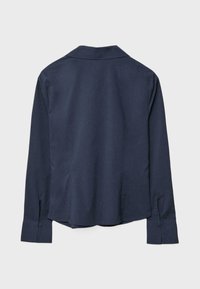 Navy blue long-sleeve shirt with a soft texture, a pointed collar, and buttoned cuffs. The back features a curved hem and no visible logos.