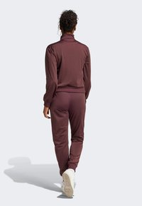 adidas Sportswear FEELCOZY SET ciemnoczerwony