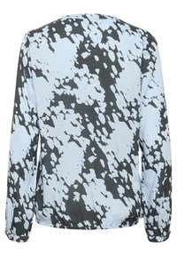 Langemouwige top met een blauw en zwart abstract patroon, gemaakt van een soepele stof met een elastische zoom en knoopmanchetten.