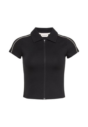 Zwart topje met rits aan de voorkant, een kraag, korte mouwen en contrasterende witte biezen langs de schouders. Gladde, rekbare stof.