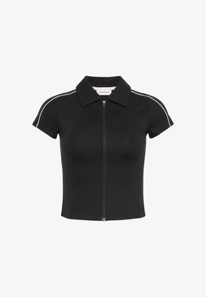 Schwarzes Oberteil mit Reißverschluss vorne, Kragen und kurzen Ärmeln, mit kontrastierendem weißen Paspelier an den Schultern. Glatter, elastischer Stoff.