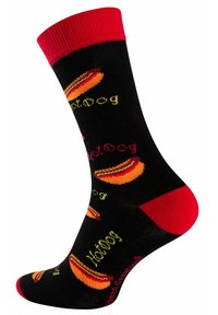 Chaussettes noires avec un revers et un talon rouges, présentant un motif de hot-dog répété en orange et jaune avec le texte "Hot Dog."
