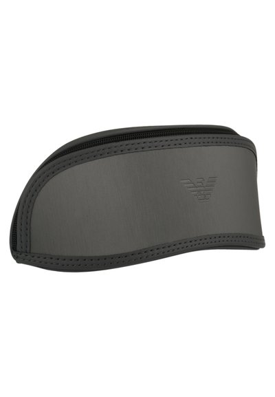 Black hard shell sunglasses case with a smooth, matte finish, rounded edges, and embossed logo. Features a zip closure with contrasting stitching.