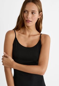 Stradivarius LANGES MIT SEITLICHEM SCHLITZ - Jersey dress - black
