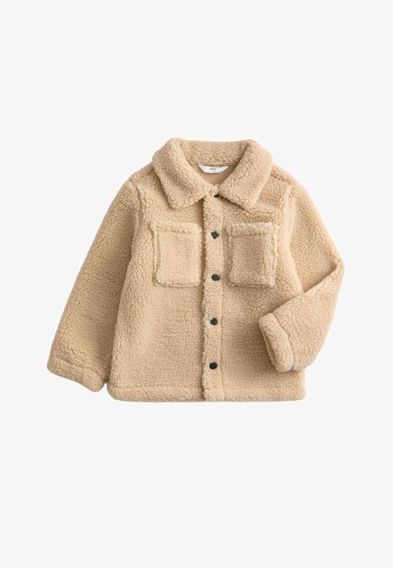 Giacca in pile beige con collo, due tasche sul petto e bottoni neri. Texture morbida e vestibilità comoda.