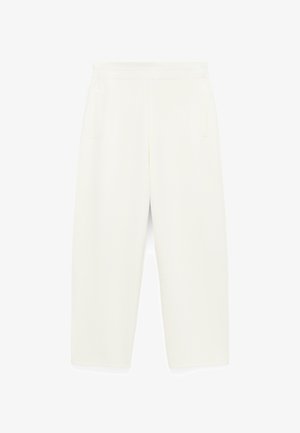Roomse broeken in roomkleur gemaakt van zacht materiaal, met twee steekzakken aan de zijkant en een gladde tailleband, met een getailleerde snit.
