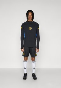 adidas Performance MANCHESTER UNITED TRAINING SHORTS - Športne kratke hlače - black/blue/tribe yellow
