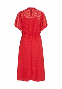 Robe midi rouge avec manches ballons transparentes, motif chevron, taille élastique et fermeture avec bouton à trou de serrure au niveau de l'encolure dos.