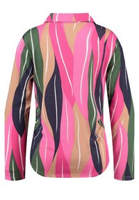 Pitkähihainen paita, jossa on värikäs lehtikuvio pinkkinä, vihreänä, beigeenä ja laivastonsinisenä. Valmistettu sileästä, joustavasta kankaasta. Kauluksellinen malli.