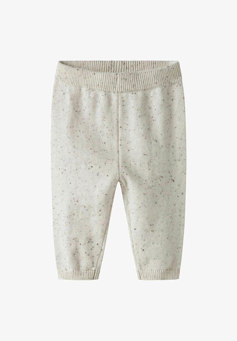 Pantalons bébé tricotés couleur crème avec des taches marron, taille côtelée et poignets côtelés.