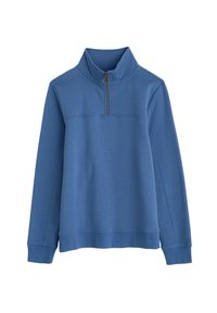 Pullover blu a maniche lunghe realizzato in tessuto morbido, con colletto alto e una breve zip frontale con una linguetta circolare.