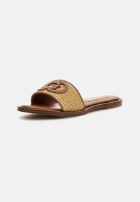 Brown and tan slide sandal featuring a woven upper with a cutout design, a smooth sole, and contrasting stitching details.