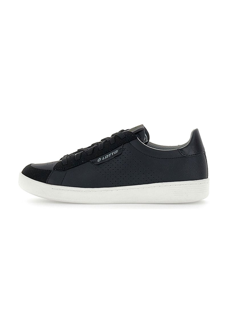 Black sneakers with a smooth leather upper, perforated side detailing, flat white rubber sole, and black laces. Features logo on the side.