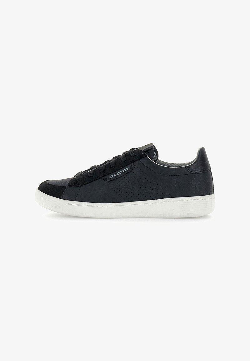 Black sneakers with a smooth leather upper, perforated side detailing, flat white rubber sole, and black laces. Features logo on the side.