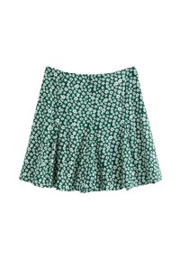 Grøn floral nederdel med en udvidet design, lavet af et let materiale. Har små hvide blomster jævnt fordelt over stoffet.