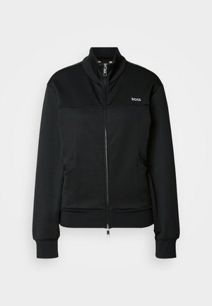 Black jacket with high collar, zip front, and two side pockets. Smooth fabric with ribbed cuffs and subtle logo detail on chest.