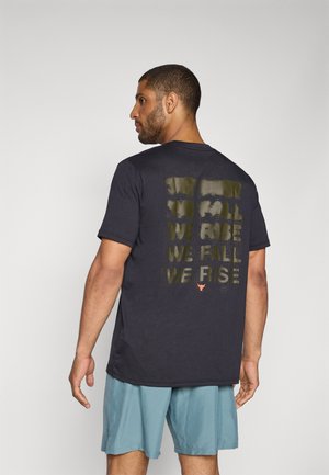 Under Armour T-shirt con stampa - black/orange base