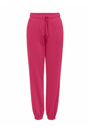 Różowe spodnie dresowe z elastycznym paskiem w talii i regulowanym sznurkiem. Zwężane mankiety przy kostkach, wykonane z miękkiego, wygodnego materiału.