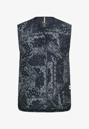 Polstret ærmeløs vest i marineblå med hvidt paisleymønster. Har quiltet tekstur, frontlukning med trykknapper og rund halsudskæring.