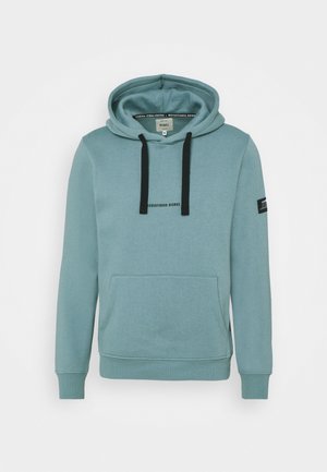 Light blue hoodie made from soft fabric featuring a front pocket, drawstring hood, and black logo text. Includes ribbed cuffs and hem.