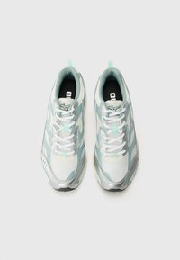 Sneakers featuring a mesh upper in white, light blue, and silver accents, with a curved sole, lace closure, and padded collar.