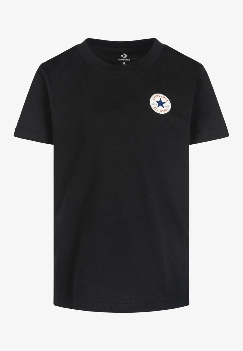 T-shirt nera di cotone con maniche corte, collo rotondo e una patch circolare bianca con la scritta "CONVERSE ALL STAR" e il logo a stella sul fronte.