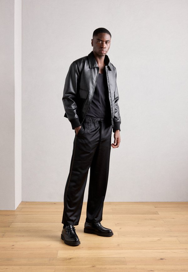 RELAXED FIT - Trousers4