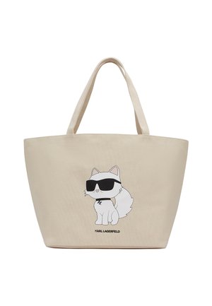 Beige tote bag made of fabric with a cartoon cat graphic wearing sunglasses. Features sturdy handles and a printed brand name at the bottom.