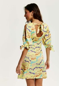 Liquorish ABSTRACT ZEBRA PRINT MINI  WITH BACK TIE UP IN YE - Day dress - multicoloured