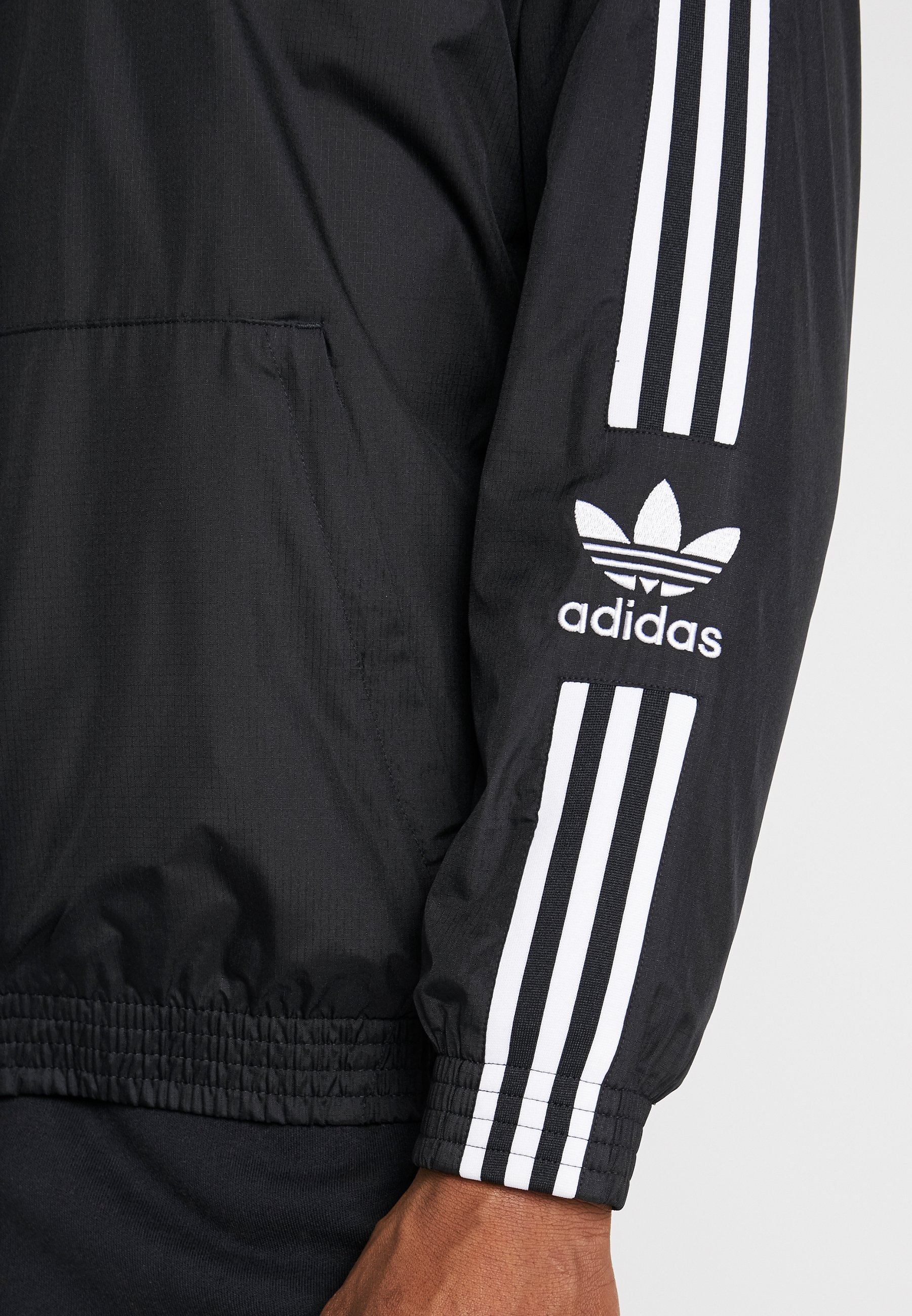 adidas originals lock up track top