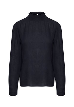 Blouse noire à manches longues avec un col haut à volants et une fermeture par boutons dans le dos, fabriquée en tissu léger.