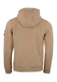 Felpa cappuccio color khaki con superficie texture, design aderente e dettagli in bianco a contrasto sui polsini e sull'orlo. Logo sulla parte posteriore.