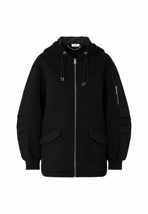 Sweat à capuche noir zippé avec cordons, deux poches à rabat devant, poignets côtelés et une poche zippée sur la manche gauche.