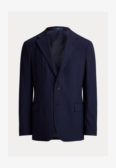 Μπλε ναυτικό σακάκι με ρίγες, κατασκευασμένο από ύφασμα με λεία υφή. Διαθέτει γιακά με εγκοπή, κούμπωμα με ένα κουμπί και δύο εμπρόσθιες τσέπες.