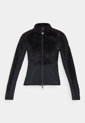 Svart zip-up jakke med en myk, strukturelt fleece øverdel og glatte, midvektige stoff ermer og underdel; har to sidelommer.